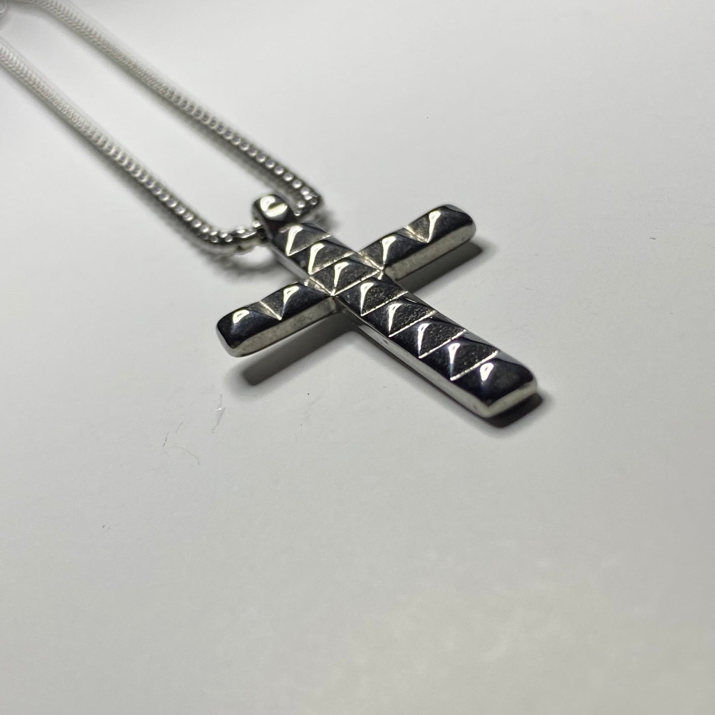 Collar cruz estoperoles