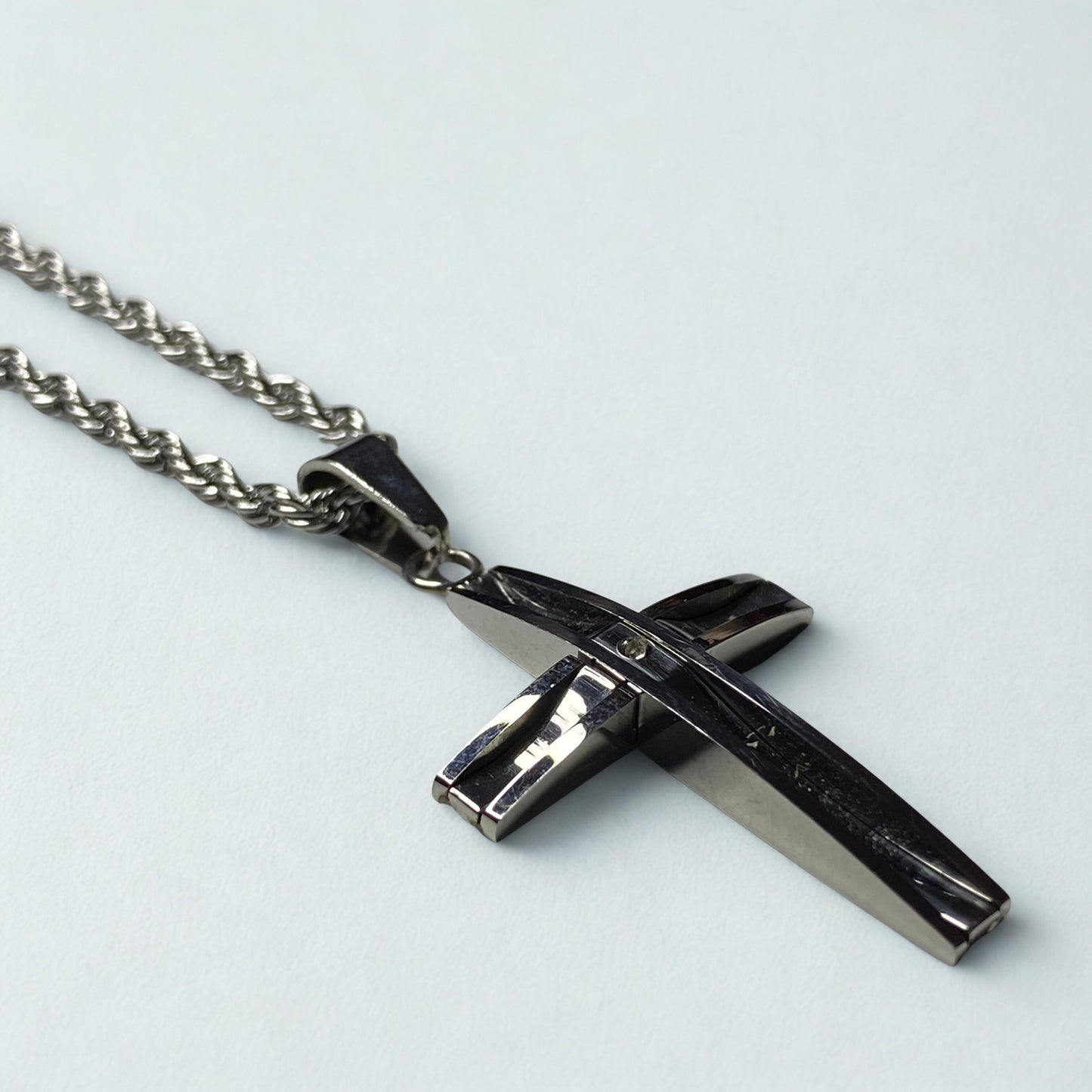 Collar cruz arqueada